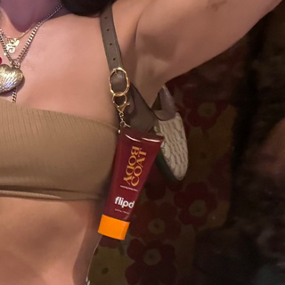 bodycoat clipped to gucci purse 
